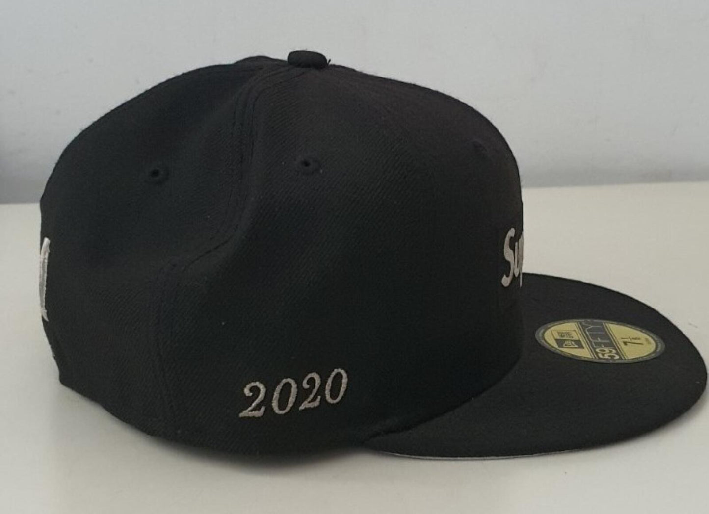 SS20 Supreme $1M box logo New Era size 7 1/8 black cap hat New with tag