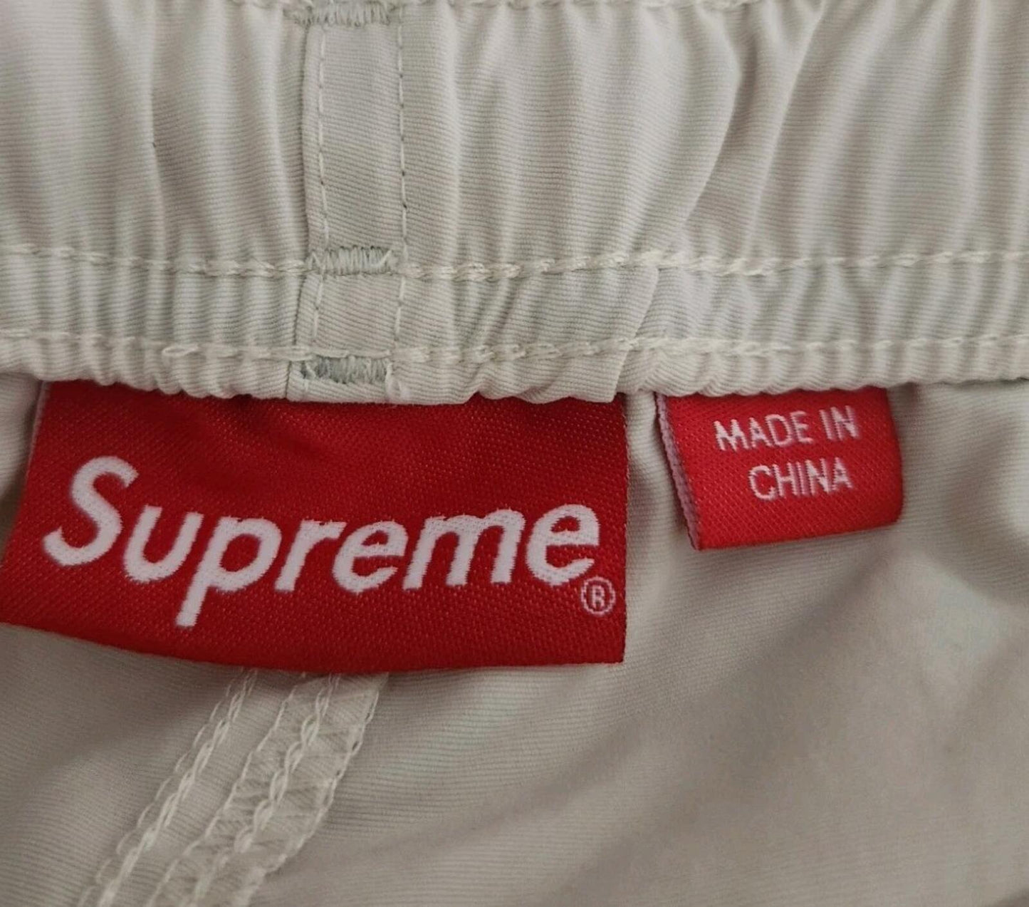 HW22 Supreme Warm Up Hose Stone Größe S klein Nylonhose Wasserabweisend Neu