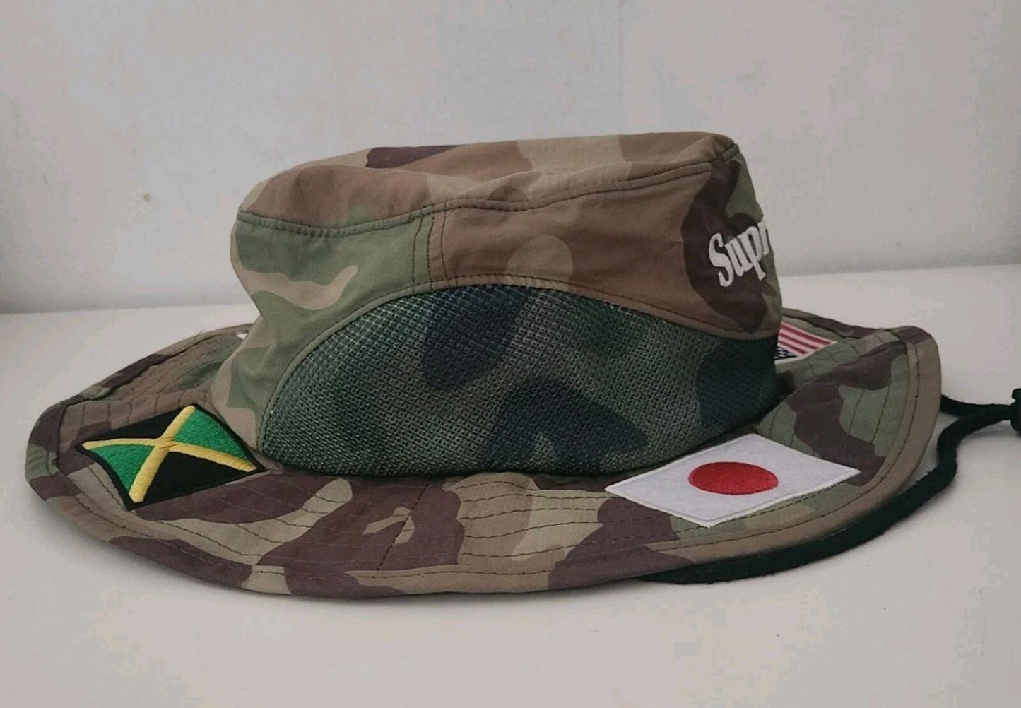 SS20 Supreme Flags Boonie Hat S / M Woodland Camo Wasserabweisend Small / Medium