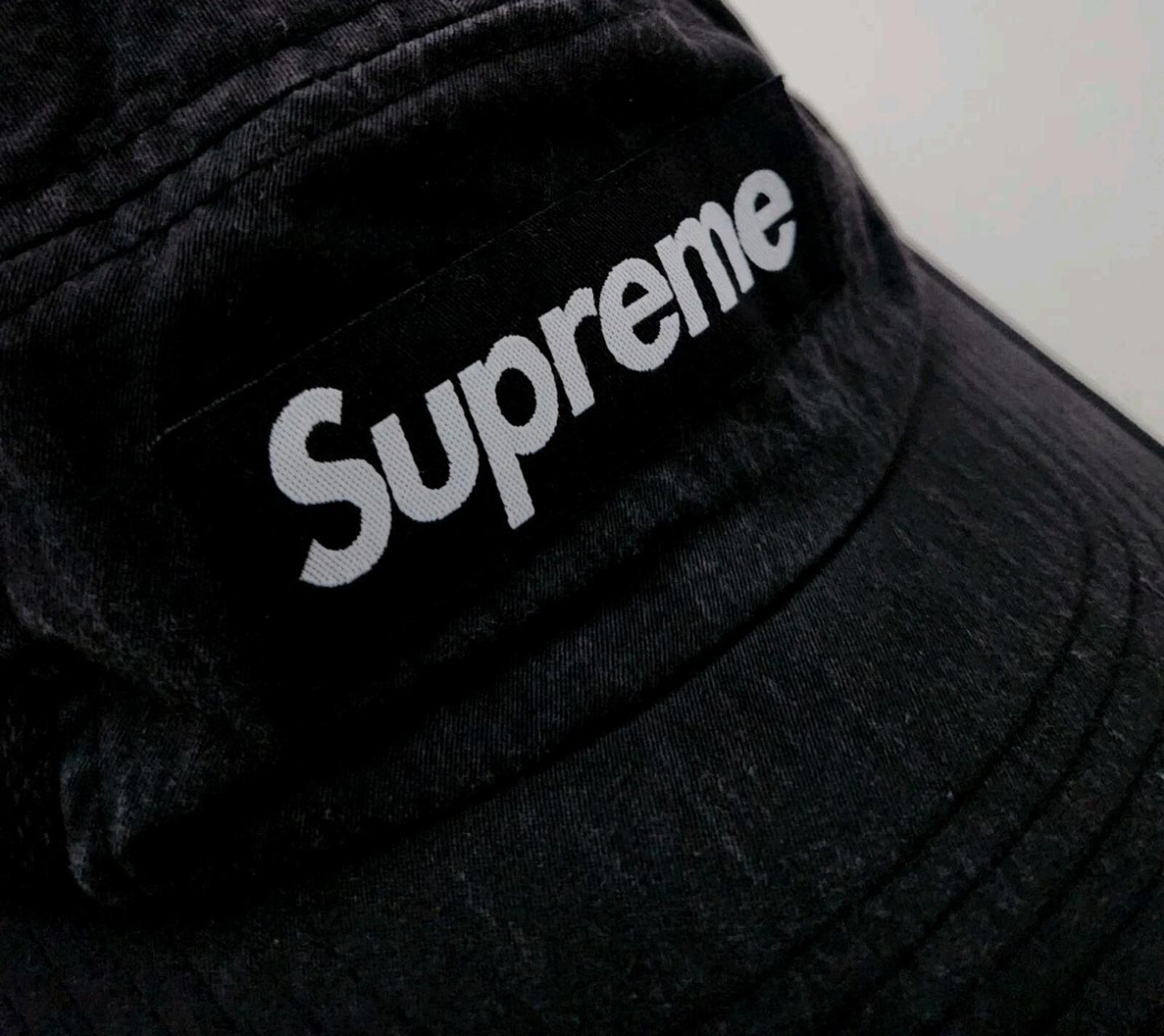 FW24 Supreme Mesh Pocket Camp Cap black nylon hat