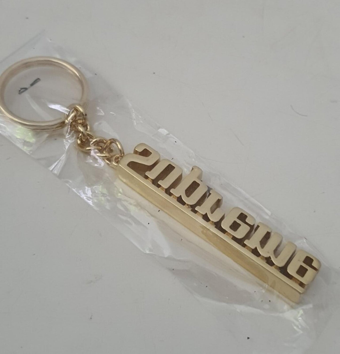 FW16 Supreme Grand Prix metal keychain gold keyring New and unopened Accessory