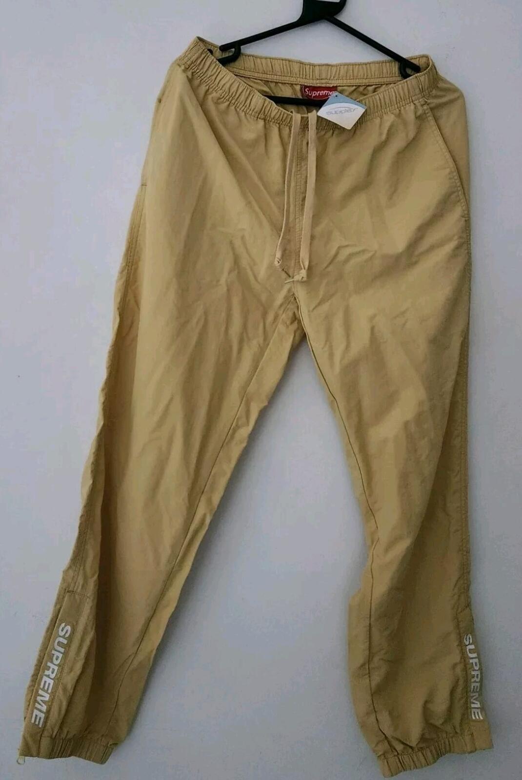 SS21 Supreme Warm Up Pants Pale Yellow Sze S Water Resistant