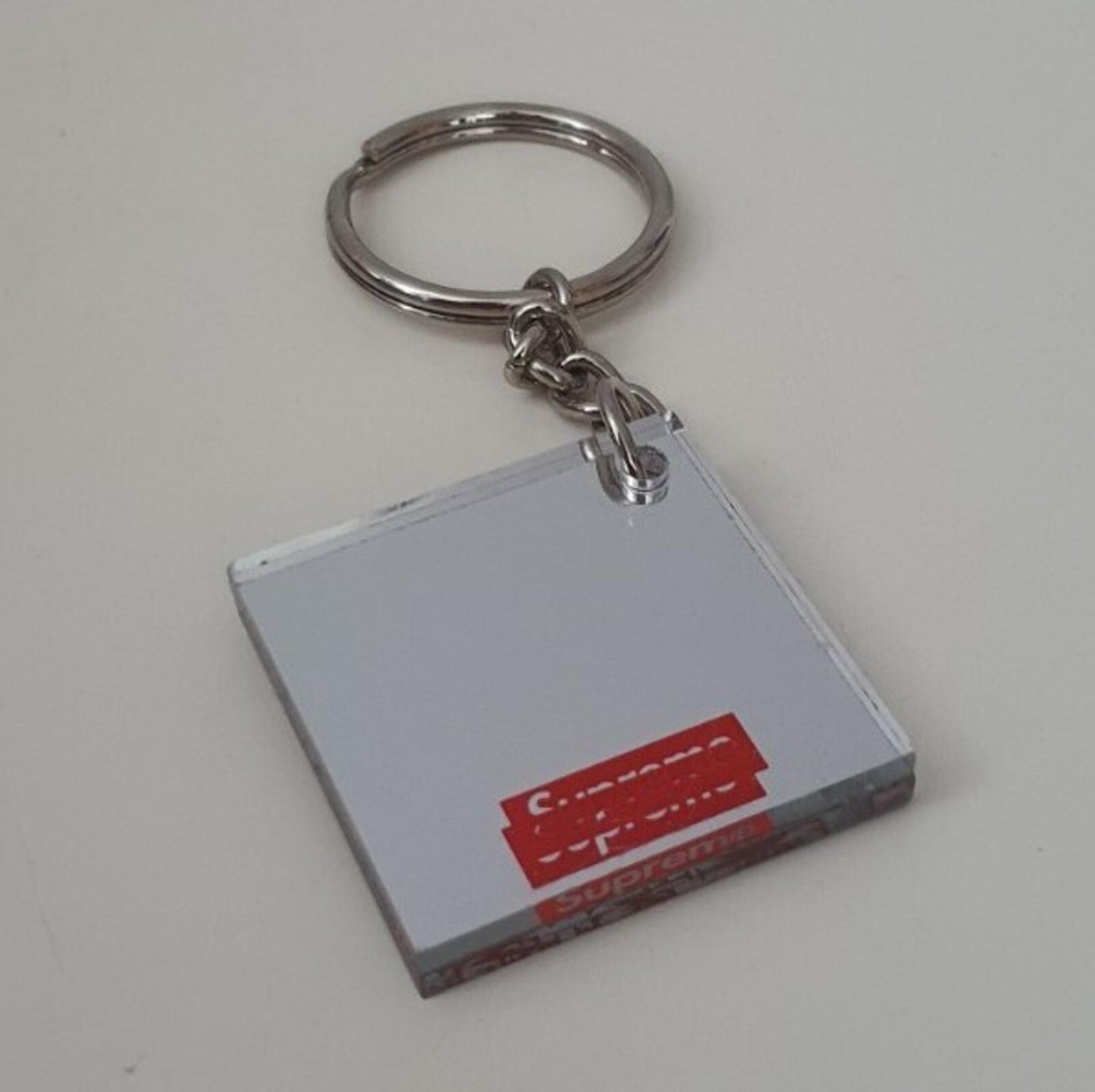SS15 Supreme Mirror keychain F UCK NEXT WEEK keyring box logo