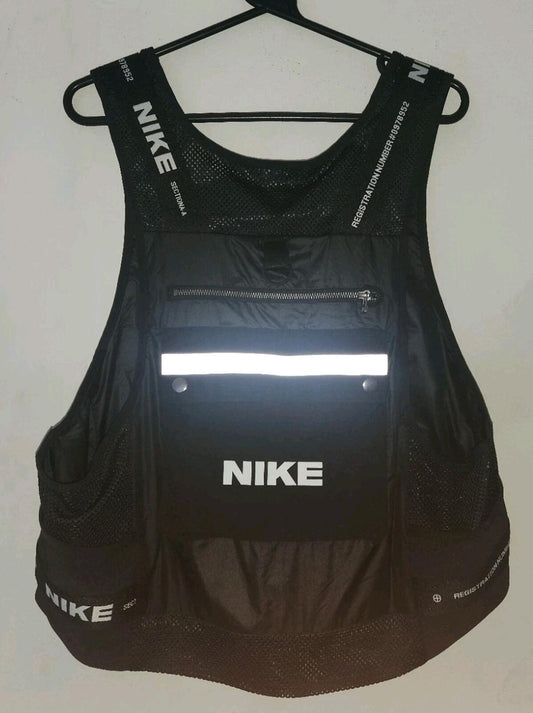 Chaleco utilitario Nike City Made Pack negro para hombre talla M mediana, nuevo, reflectante