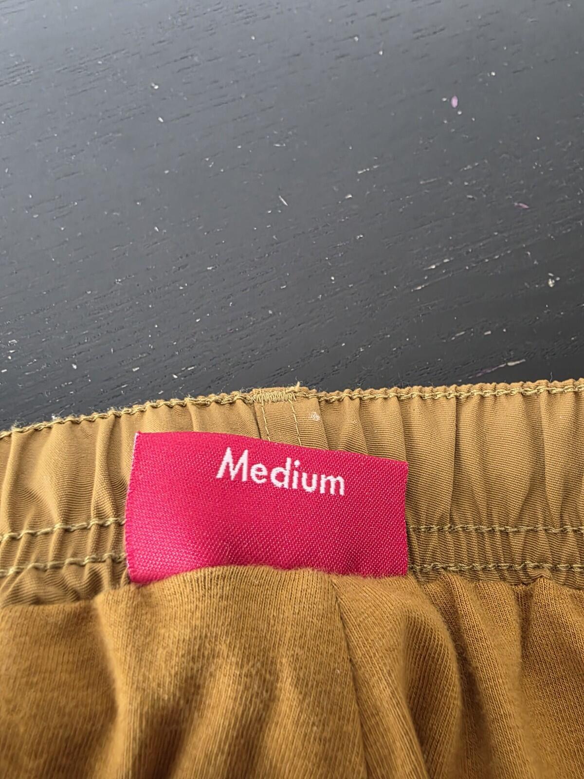 SS21 Supreme Spellout Track Pant Dark Gold Size M
