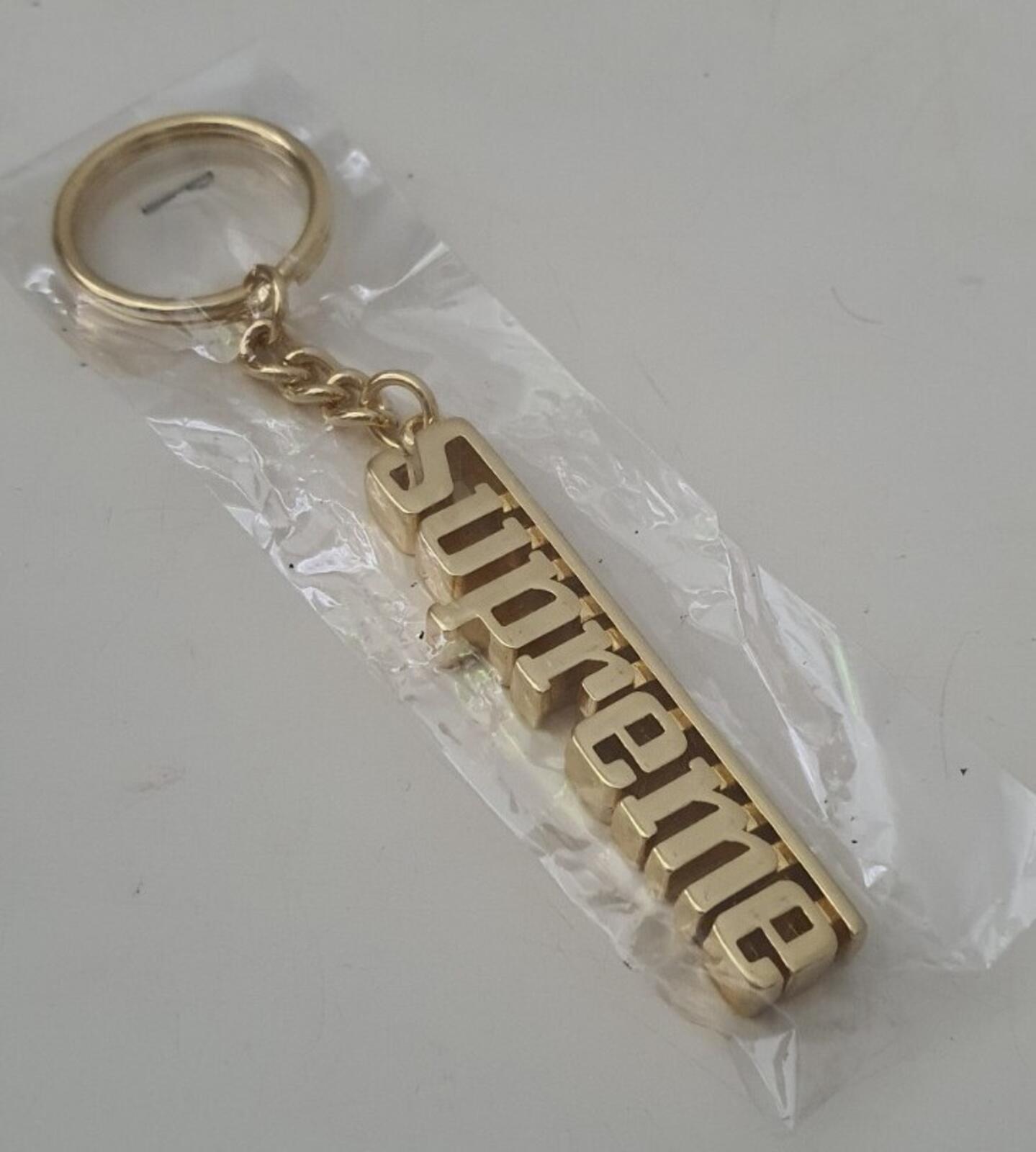 FW16 Supreme Grand Prix metal keychain gold keyring New and unopened Accessory