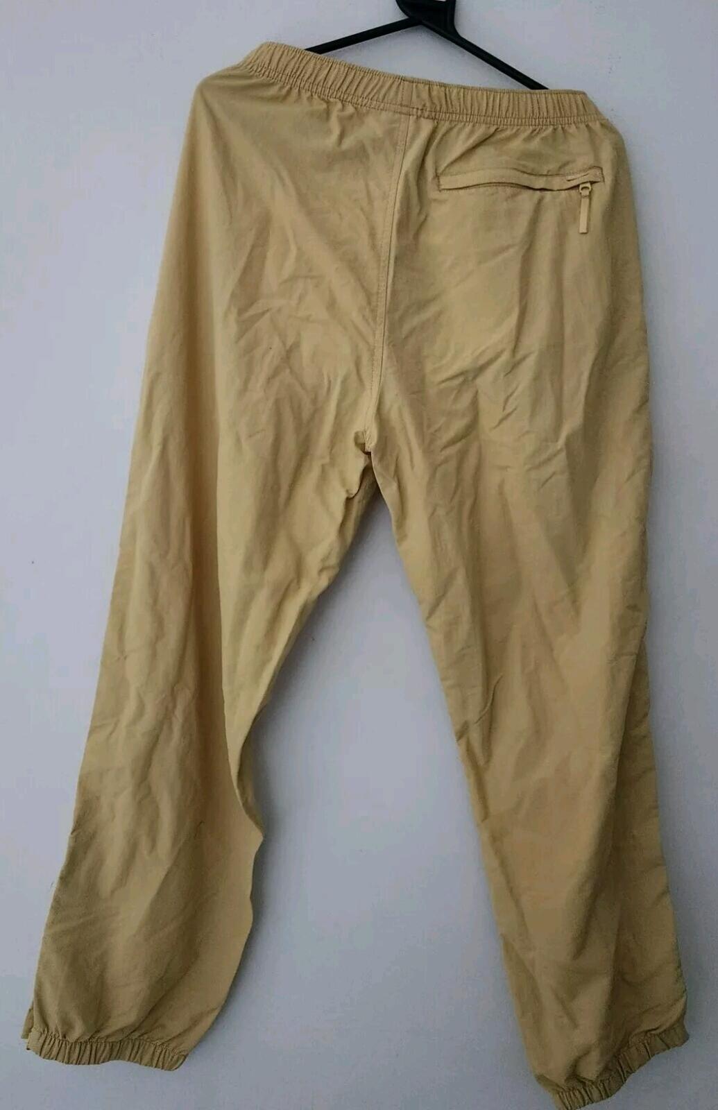 SS21 Supreme Warm Up Pants Pale Yellow Sze S Water Resistant