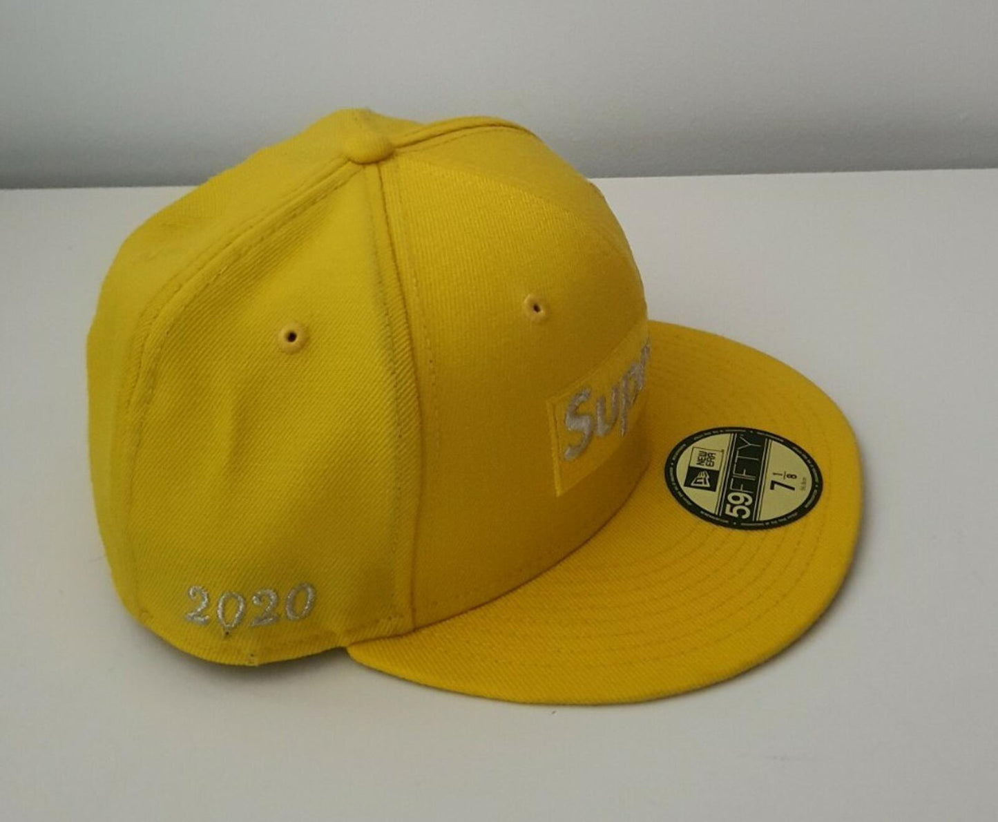 SS20 Supreme $1M box logo New Era size 7 1/8 yellow cap