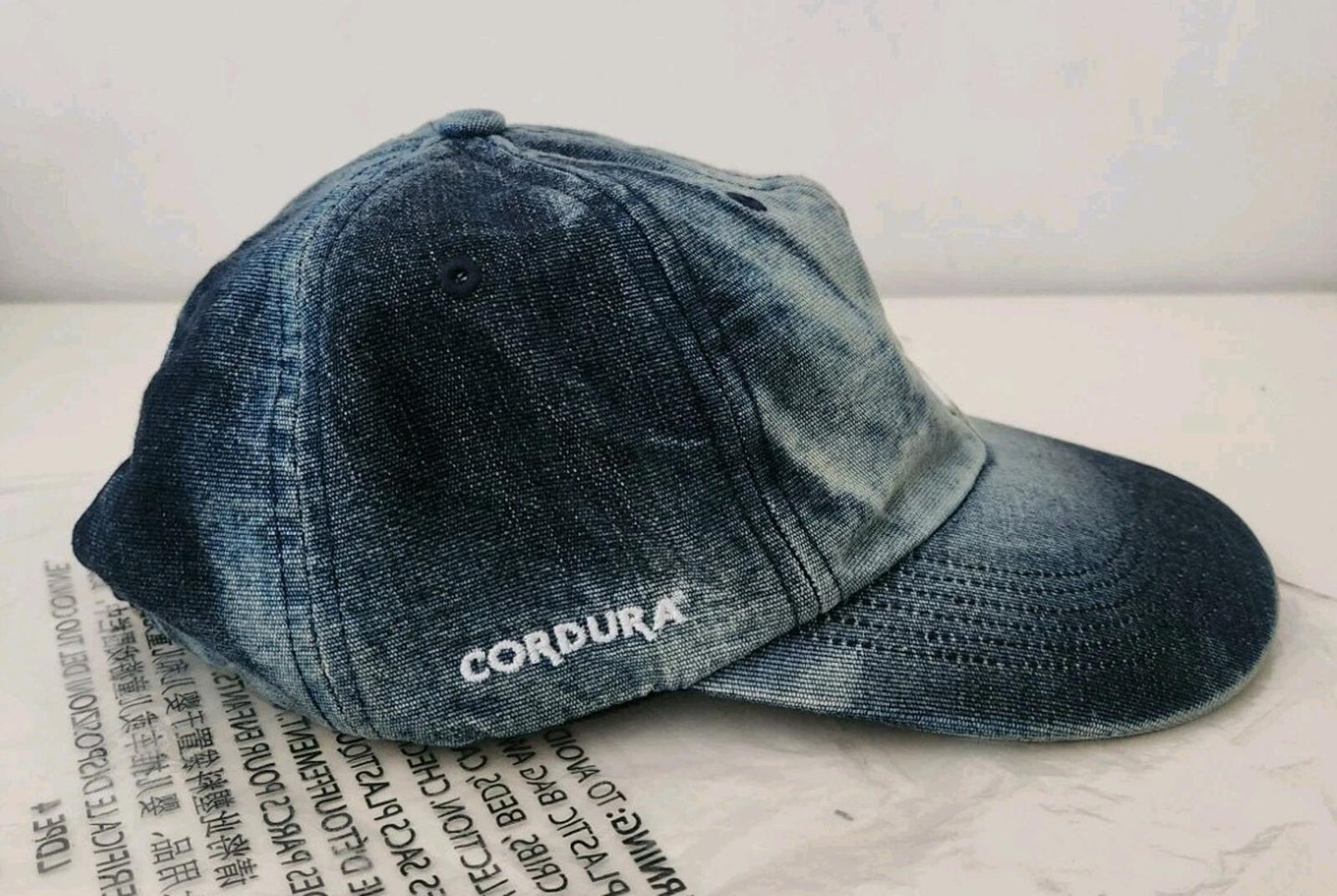 SS24 Supreme Cordura Denim S Logo 6-Panel Cap Bleached Indigo
