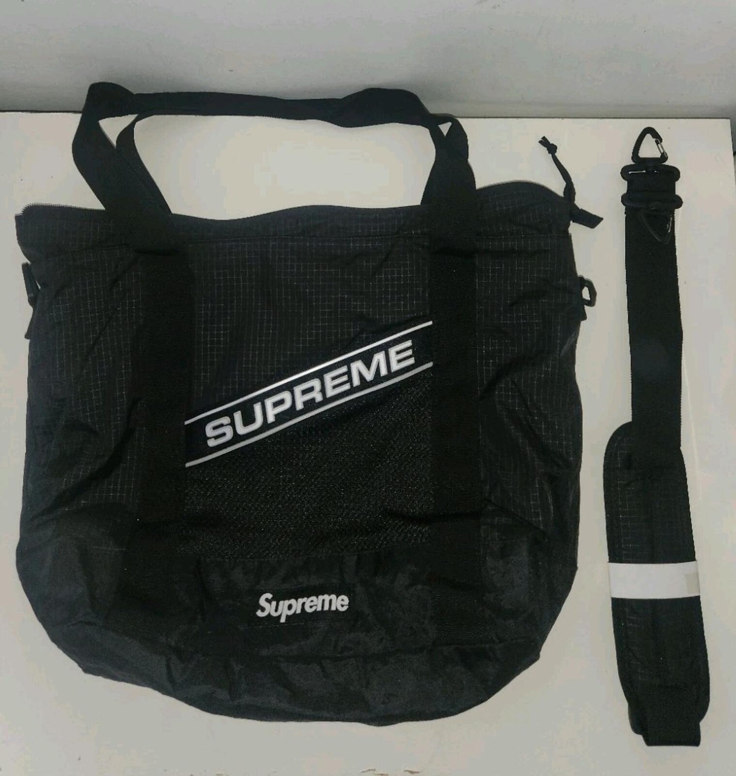FW23 Supreme Tote Bag Water Resistant Reflective Logo Black 20L Duffle