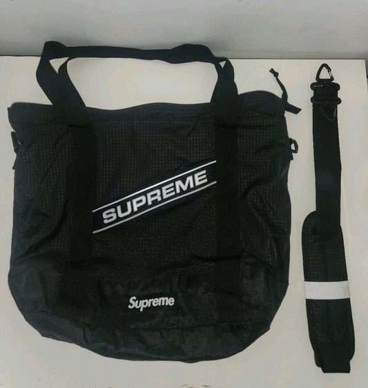 Bolso de mano Supreme FW23 resistente al agua, logo reflectante, negro, 20L, tipo duffle