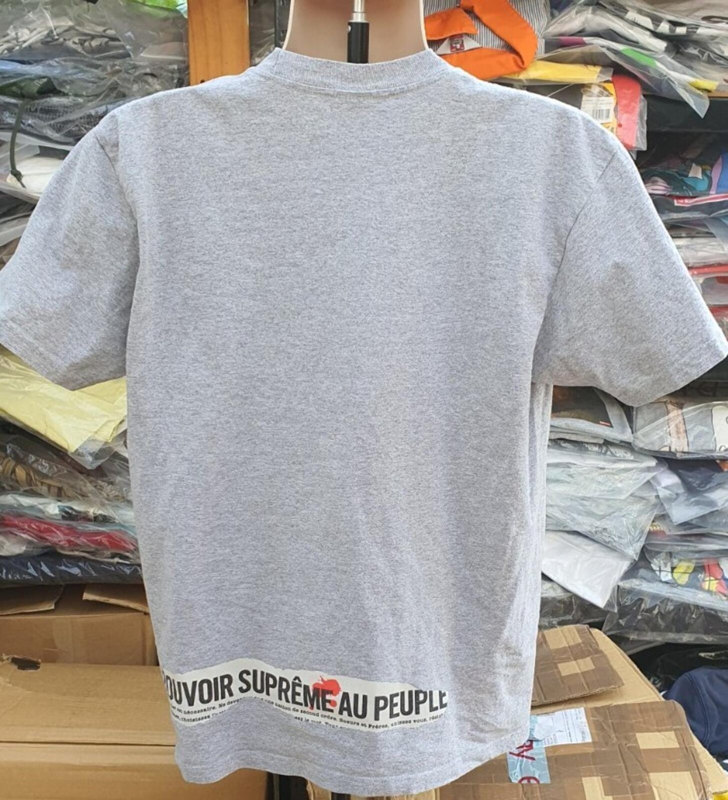 Camiseta SS19 Supreme Headline talla M gris jaspeado "Pouvoir"