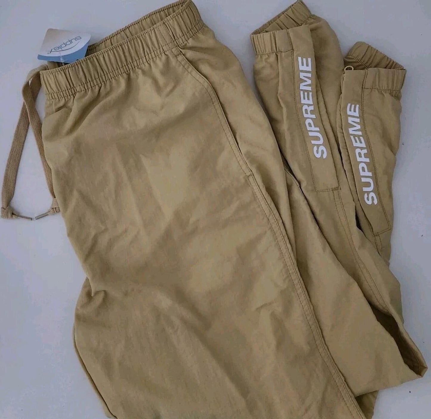 SS21 Supreme Warm Up Pants Pale Yellow Sze S Water Resistant